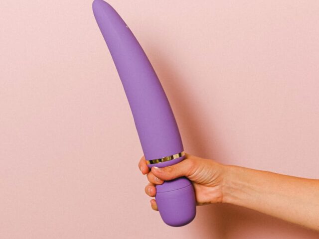 Hand Holding a Vibrator