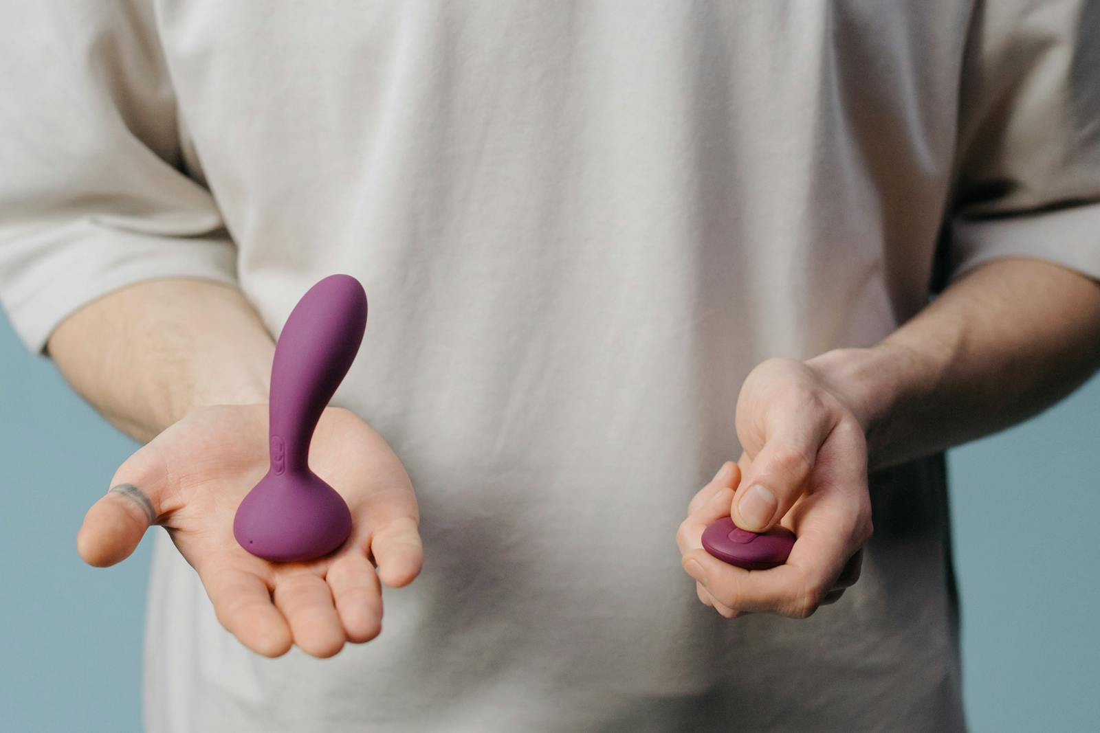 Hands Holding Sex Toy