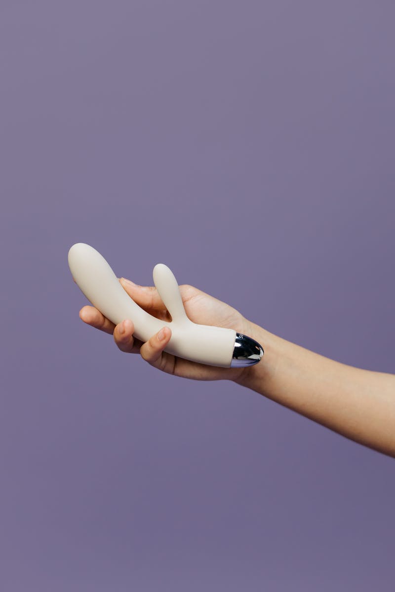 A Person Holding a Vibrator